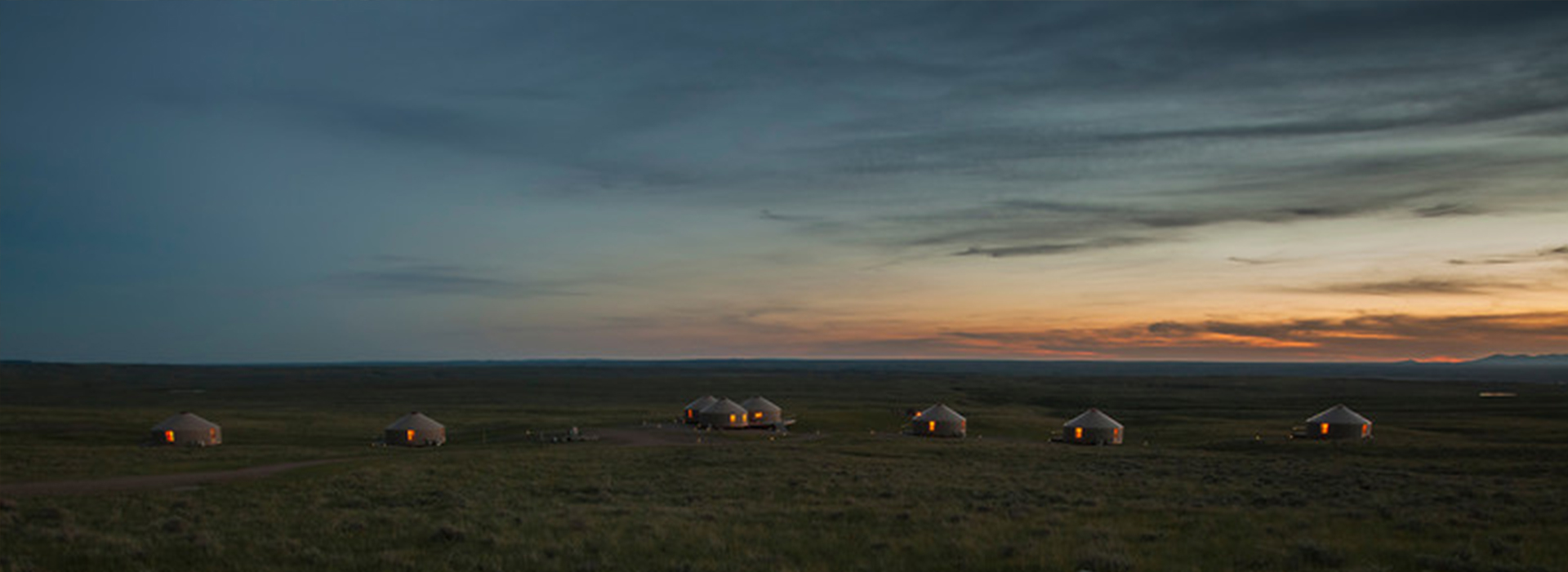 8 shelter designs yurts on the plains with a sunset sky