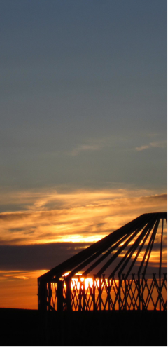 big sky yurt frame against a sunset