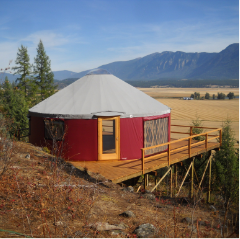 red shelter designs yurt on a platform in flathead valley