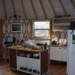 interior view of a kitchen inside a yurt