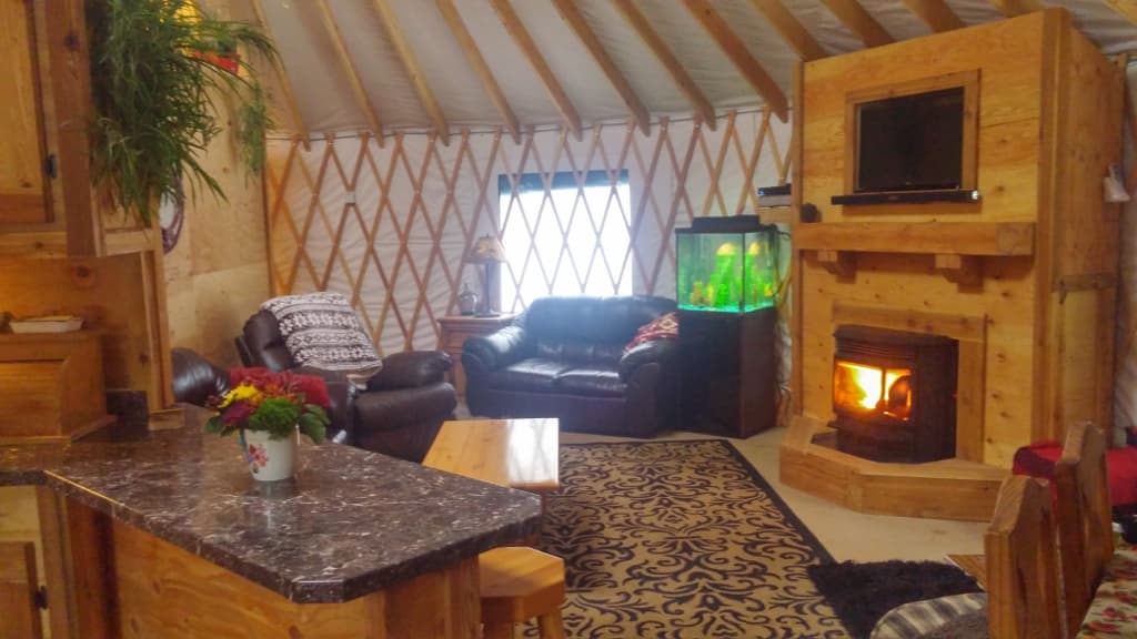 yurt living room with a fireplace