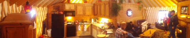 people sitting in a yurt house