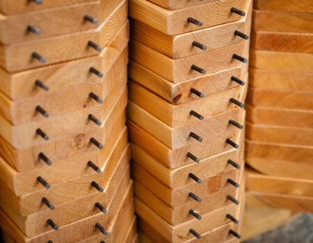 several wood boards sitting on the ground