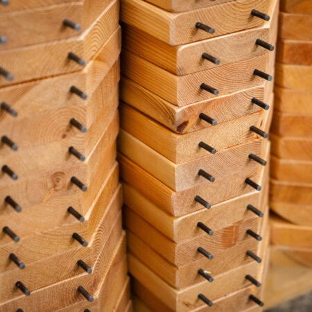 several wood boards sitting on the ground
